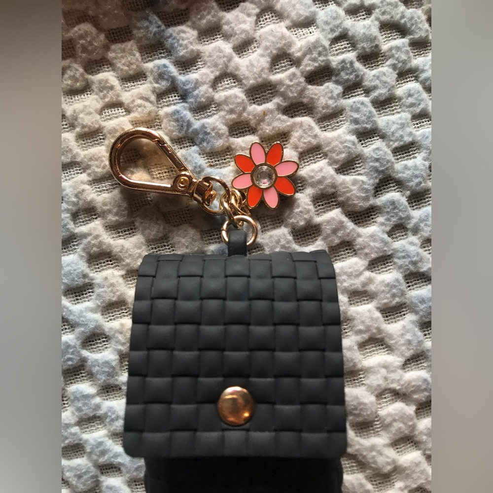 Hand sanitizer holder